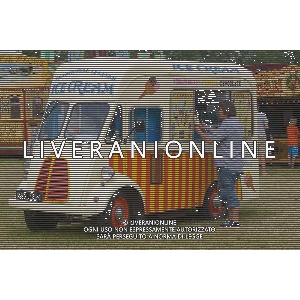 Atmosphere at WOMAD - World of Music, Arts and Dance. Purchasing Ice-Cream from a period Ice-Cream van. ©PHOTOSHOT/Agenzia Aldo Liverani sas - ITALY ONLY - EDITORIAL USE ONLY