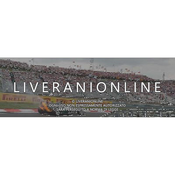 (140726) -- MOGYOROD, July 26, 2014 () -- Mercedes Formula One driver Lewis Hamilton of Britain drives his burning car during the qualifying session of the F1 Hungarian Grand Prix at Hungaroring in Mogyorod, Hungary on July 26, 2014. Hamilton will start from 21st place in Sunday\'s contest. (/Ferenc Ember) ©PHOTOSHOT/Agenzia Aldo Liverani sas - ITALY ONLY - EDITORIAL USE ONLY - GP UNGHERIA F1
