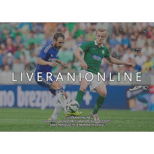 Cesc Fabregas #4 of Chelsea FC vs Nik Omladic #21 of NK Olimpija Ljubljana // during international Friendly between NK Olimpija Ljubljana and Chelsea FC at the SRC Stozice in Ljubljana, Slovenia on 2014/07/27. EXPA Pictures © 2014, PhotoCredit: EXPA/ Sportida/ Vid Ponikvar *****ATTENTION - OUT of SLO, FRA***** ©photoshot/Agenzia Aldo Liverani sas - ITALY ONLY - EDITORIAL USE ONLY - NK Olimpija Ljubljana Vs Chelsea FC partita amichevole internazionale allo SRC Stozice a Lubiana, in Slovenia 27 luglio 2014