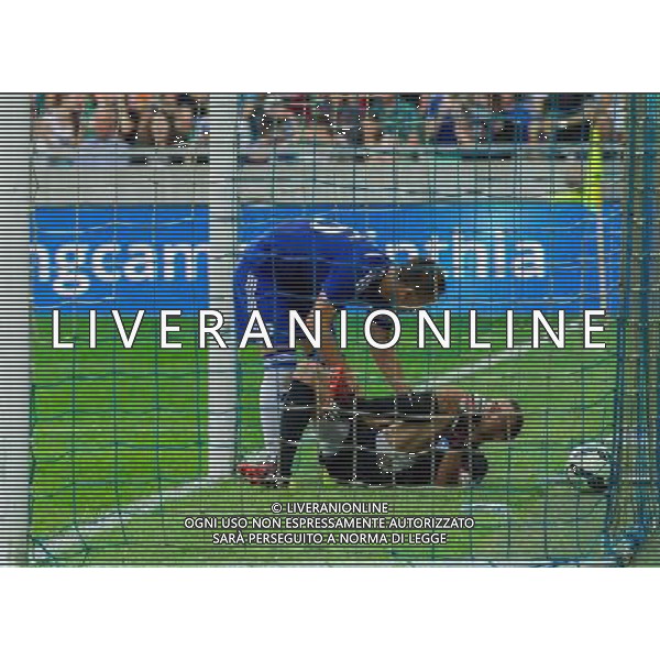 John Terry #26 of Chelsea FC and injured Aleksander Seliga #1 of NK Olimpija Ljubljana // during international Friendly between NK Olimpija Ljubljana and Chelsea FC at the SRC Stozice in Ljubljana, Slovenia on 2014/07/27. EXPA Pictures © 2014, PhotoCredit: EXPA/ Sportida/ Vid Ponikvar *****ATTENTION - OUT of SLO, FRA***** ©photoshot/Agenzia Aldo Liverani sas - ITALY ONLY - EDITORIAL USE ONLY - NK Olimpija Ljubljana Vs Chelsea FC partita amichevole internazionale allo SRC Stozice a Lubiana, in Slovenia 27 luglio 2014