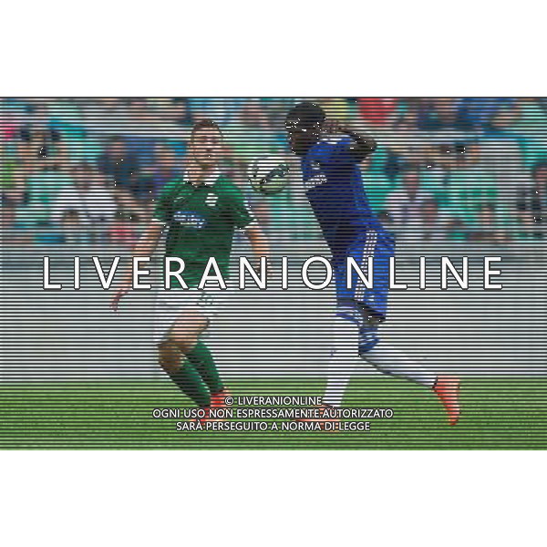 Andraz Sporar #10 of NK Olimpija Ljubljana and Kurt Zouma #5 of Chelsea FC // during international Friendly between NK Olimpija Ljubljana and Chelsea FC at the SRC Stozice in Ljubljana, Slovenia on 2014/07/27. EXPA Pictures © 2014, PhotoCredit: EXPA/ Sportida/ Vid Ponikvar *****ATTENTION - OUT of SLO, FRA***** ©photoshot/Agenzia Aldo Liverani sas - ITALY ONLY - EDITORIAL USE ONLY - NK Olimpija Ljubljana Vs Chelsea FC partita amichevole internazionale allo SRC Stozice a Lubiana, in Slovenia 27 luglio 2014