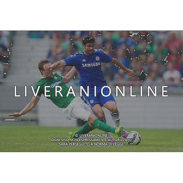 Antonio Delamea Mlinar #20 of NK Olimpija Ljubljana with sliding tackle against Diego Costa #19 of Chelsea FC // during international Friendly between NK Olimpija Ljubljana and Chelsea FC at the SRC Stozice in Ljubljana, Slovenia on 2014/07/27. EXPA Pictures © 2014, PhotoCredit: EXPA/ Sportida/ Matic Klansek Velej *****ATTENTION - OUT of SLO, FRA***** ©PHOTOSHOT/Agenzia Aldo Liverani sas - ITALY ONLY - EDITORIAL USE ON - NK Olimpija Ljubljana Vs Chelsea FC partita amichevole internazionale allo SRC Stozice a Lubiana, in Slovenia 27 luglio 2014
