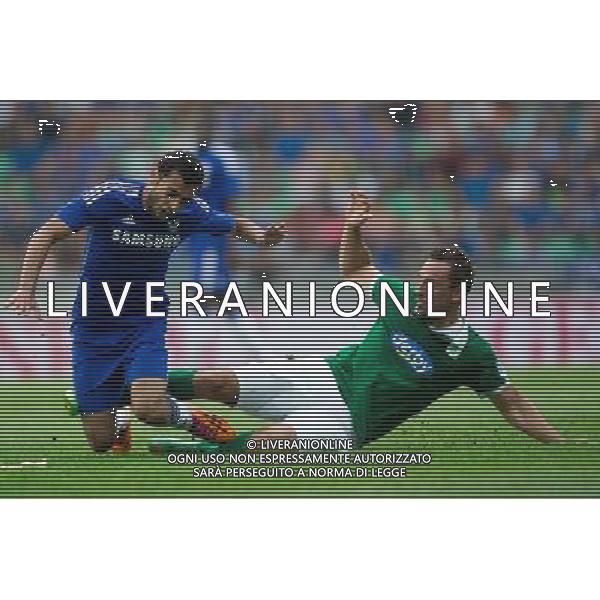 Aleksandar Rodic #7 of NK Olimpija Ljubljana tackles Mohamed Salah #17 of Chelsea FC // during international Friendly between NK Olimpija Ljubljana and Chelsea FC at the SRC Stozice in Ljubljana, Slovenia on 2014/07/27. EXPA Pictures © 2014, PhotoCredit: EXPA/ Sportida/ Matic Klansek Velej *****ATTENTION - OUT of SLO, FRA***** ©PHOTOSHOT/Agenzia Aldo Liverani sas - ITALY ONLY - EDITORIAL USE ON - NK Olimpija Ljubljana Vs Chelsea FC partita amichevole internazionale allo SRC Stozice a Lubiana, in Slovenia 27 luglio 2014