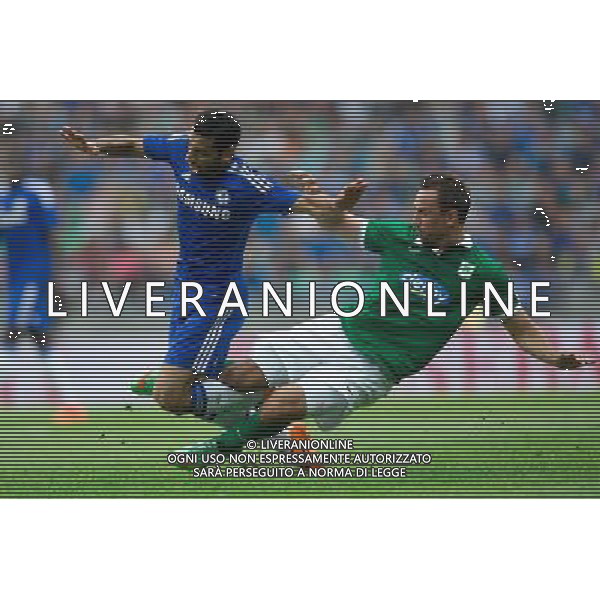 Aleksandar Rodic #7 of NK Olimpija Ljubljana tackles Mohamed Salah #17 of Chelsea FC // during international Friendly between NK Olimpija Ljubljana and Chelsea FC at the SRC Stozice in Ljubljana, Slovenia on 2014/07/27. EXPA Pictures © 2014, PhotoCredit: EXPA/ Sportida/ Matic Klansek Velej *****ATTENTION - OUT of SLO, FRA***** ©PHOTOSHOT/Agenzia Aldo Liverani sas - ITALY ONLY - EDITORIAL USE ON - NK Olimpija Ljubljana Vs Chelsea FC partita amichevole internazionale allo SRC Stozice a Lubiana, in Slovenia 27 luglio 2014