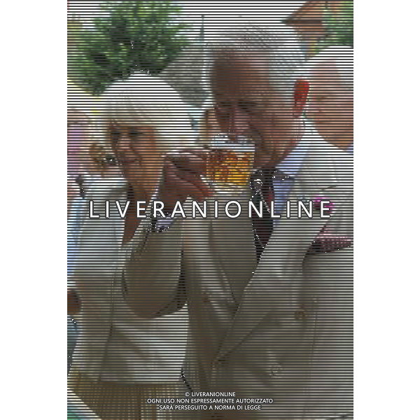 (d) Camilla Duchess of Cornwall and Prince Charles enjoy some beer tasting during a visit to the market town of Oakham Prince of Wales and Duchess of Cornwall visits Rutland, Britain - 28 Jul 2014 ©photoshot/Agenzia Aldo Liverani sas - ITALY ONLY - EDITORIAL USE ONLY - REALI INGLESI: Il Principe Carlo d\'inghilterra e la moglie Camilla Duchessa di Cornovaglia in visita ufficiale alla citta\' mercato di Oakham Rutland, Regno Unito - 28 luglio 2014