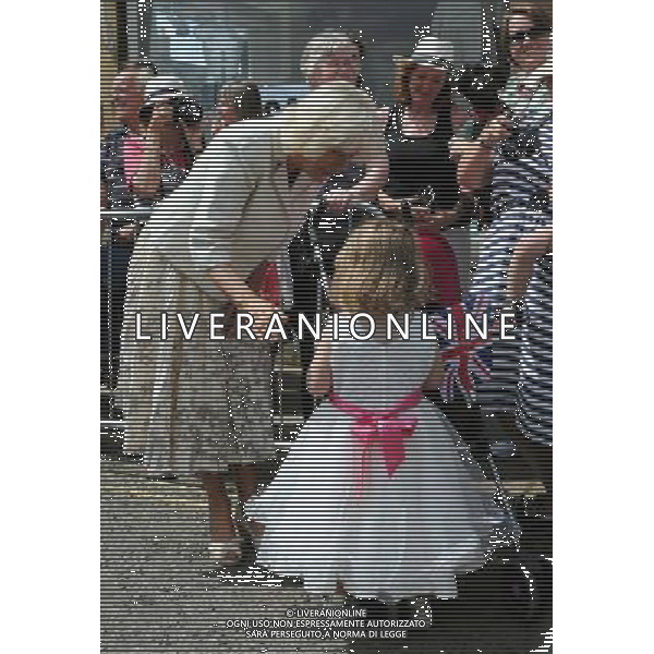 (k) Camilla Duchess of Cornwall during a visit to the market town of Oakham Prince of Wales and Duchess of Cornwall visits Rutland, Britain - 28 Jul 2014 ©photoshot/Agenzia Aldo Liverani sas - ITALY ONLY - EDITORIAL USE ONLY - REALI INGLESI: Il Principe Carlo d\'inghilterra e la moglie Camilla Duchessa di Cornovaglia in visita ufficiale alla citta\' mercato di Oakham Rutland, Regno Unito - 28 luglio 2014