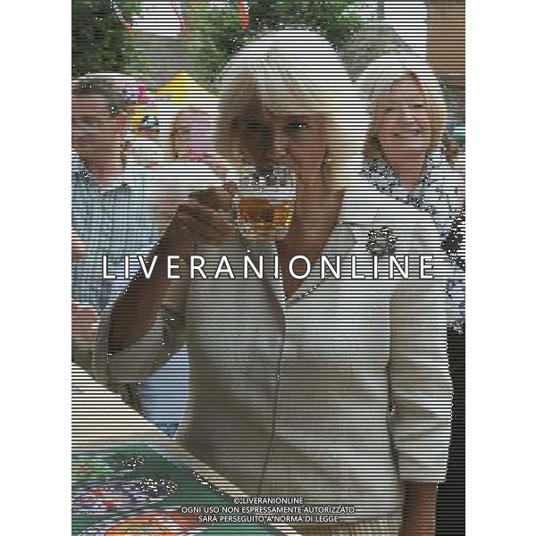 (r) Camilla Duchess of Cornwall beer tasting during a visit to the market town of Oakham Prince of Wales and Duchess of Cornwall visits Rutland, Britain - 28 Jul 2014 ©photoshot/Agenzia Aldo Liverani sas - ITALY ONLY - EDITORIAL USE ONLY - REALI INGLESI: Il Principe Carlo d\'inghilterra e la moglie Camilla Duchessa di Cornovaglia in visita ufficiale alla citta\' mercato di Oakham Rutland, Regno Unito - 28 luglio 2014