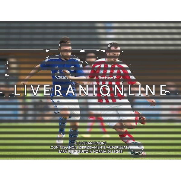 Marco Hˆger (FC Schalke 04) gegen Charlie Adam (Stoke City) // during a Friendly Match between FC Schalke 04 and Stoke City at the Kufstein Arena, Kufstein, Austria on 2014/07/29. EXPA Pictures © 2014, PhotoCredit: EXPA/ Johann Groder AG ALDO LIVERANI SAS ONLY ITALY