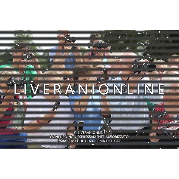 Members of the public take photos of the Prince of Wales and the Duchess of Cornwall during their visit to the Sandringham flower show held on the Royal Estate in Norfolk. ©photoshot/Agenzia Aldo Liverani sas - ITALY ONLY - REALI INGLESI: Camilla Duchessa di Cornovaglia durante la sua visita alla mostra floreale Sandringham tenutasi sul Royal Estate a Norfolk.