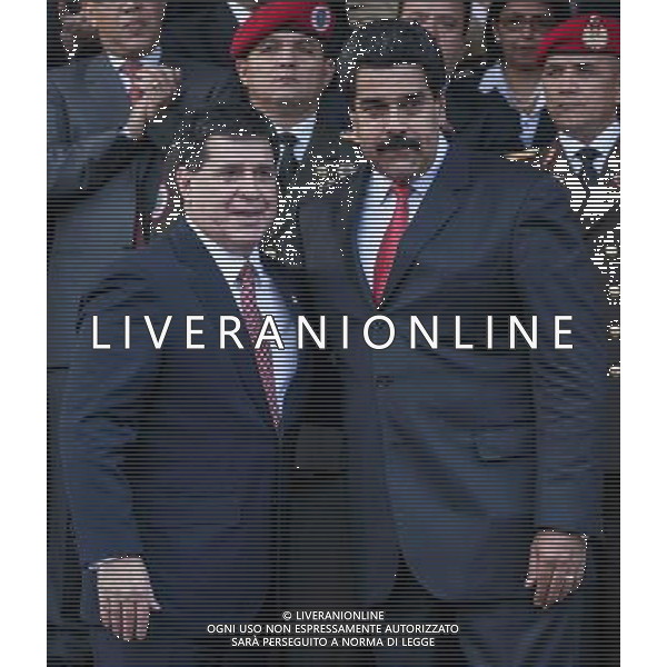 (140730) -- CARACAS, July 30, 2014 () -- Venezuelan President Nicolas Maduro (R) and his Paraguayan counterpart Horacio Cartes react after their meeting at the Miraflores presidential Palace in Caracas, Venezuela, on July 29, 2014. (/Boris Vergara)(zhf) ©photoshot/Agenzia Aldo Liverani sas - ITALY ONLY - EDITORIAL USE ONLY - Meeting a Caracas, in Venezuela, il 29 luglio 2014.