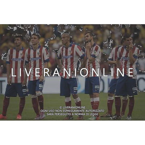 MX16 (140730) -- CIUDAD DE MEXICO, julio 30, 2014 (Xinhua) -- Jugadores de Atlético de Madrid, reaccionan al término del encuentro ante América, durante el partido correspondiente a la Copa Euroamericana, celebrado en el Estadio Azteca, en la Ciudad de México, capital de México, el 30 de julio de 2014. (Xinhua/Pedro Mera) (pm) ©photoshot/Agenzia Aldo Liverani sas - ITALY ONLY - EDITORIAL USE ONLY ©photoshot/Agenzia Aldo Liverani sas - ITALY ONLY - EDITORIAL USE ONLY - AMERICA VS ATLETICO MADRID alla Coppa euro-americano, tenutosi allo Stadio Azteca di Citta\' del Messico, 30 luglio 2014
