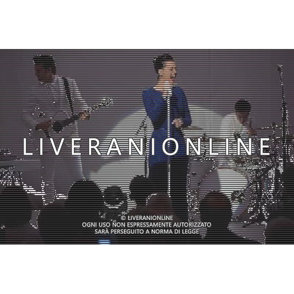 Singer Katy Perry performs during a a concert commemorating the Special Olympics with United States President Barack Obama (first row, back) in the State Dining Room of the White House in Washington, D.C., U.S., on Thursday, July 31, 2014. ©PHOTOSHOT/Agenzia Aldo Liverani sas - ITALY ONLY - EDITORIAL USE ONLY