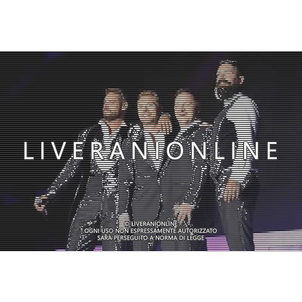 Boyzone (left to right:- Keith Duffy, Ronan Keating, Mikey Graham \'. Shane Lynch) Perform On Stage During Epsom Live Music Nights At Epsom Downs Racecourse, Epsom, Surrey on Thursday 31 July 2014. ag aldo liverani sas only italy