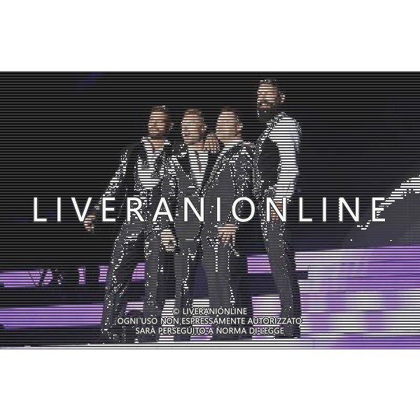 Boyzone (left to right:- Keith Duffy, Ronan Keating, Mikey Graham \'. Shane Lynch) Perform On Stage During Epsom Live Music Nights At Epsom Downs Racecourse, Epsom, Surrey on Thursday 31 July 2014. ag aldo liverani sas only italy