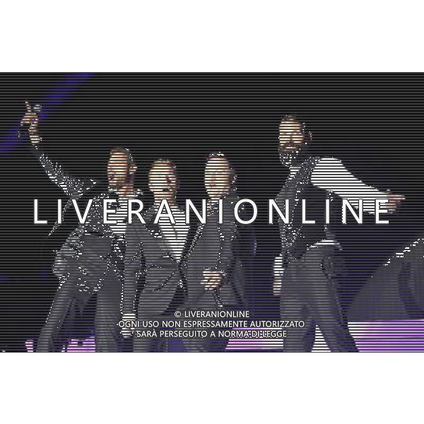 Boyzone (left to right:- Keith Duffy, Ronan Keating, Mikey Graham \'. Shane Lynch) Perform On Stage During Epsom Live Music Nights At Epsom Downs Racecourse, Epsom, Surrey on Thursday 31 July 2014. ag aldo liverani sas only italy