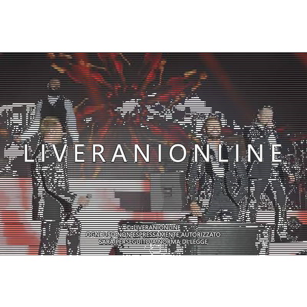 Boyzone (left to right:- Shane Lynch, Ronan Keating, Keith Duffy \' Mikey Graham) Perform On Stage During Epsom Live Music Nights At Epsom Downs Racecourse, Epsom, Surrey on Thursday 31 July 2014. ag aldo liverani sas only italy