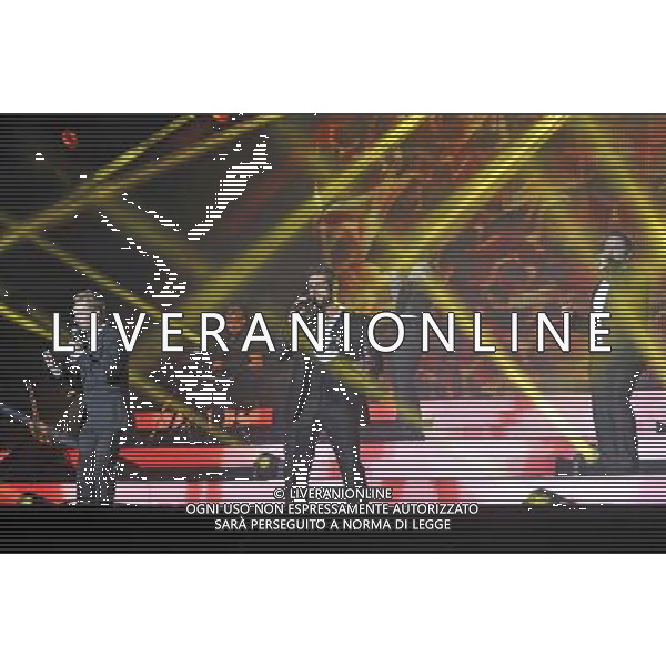 Boyzone (left to right:- Ronan Keating, Keith Duffy, Shane Lynch \' Mikey Graham) Perform On Stage During Epsom Live Music Nights At Epsom Downs Racecourse, Epsom, Surrey on Thursday 31 July 2014. ag aldo liverani sas only italy