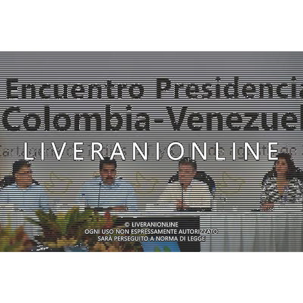 (140801) -- CARTAGENA, Aug. 1, 2014 () -- Image provided by the Colombian Presidency shows Colombian President Juan Manuel Santos(2nd R) and his Venezuelan counterpart Nicolas Maduro(2nd L) attending a bilateral meeting, in Cartagena, Colombia, on Aug. 1, 2014. Santos and Maduro aimed to strenghten the diplomatic ties, combat smuggling across their borders and address economic issues during the meeting, according to the local press. (/Colombian Presidency) ©PHOTOSHOT/Agenzia Aldo Liverani sas - ITALY ONLY - EDITORIAL USE ONLY