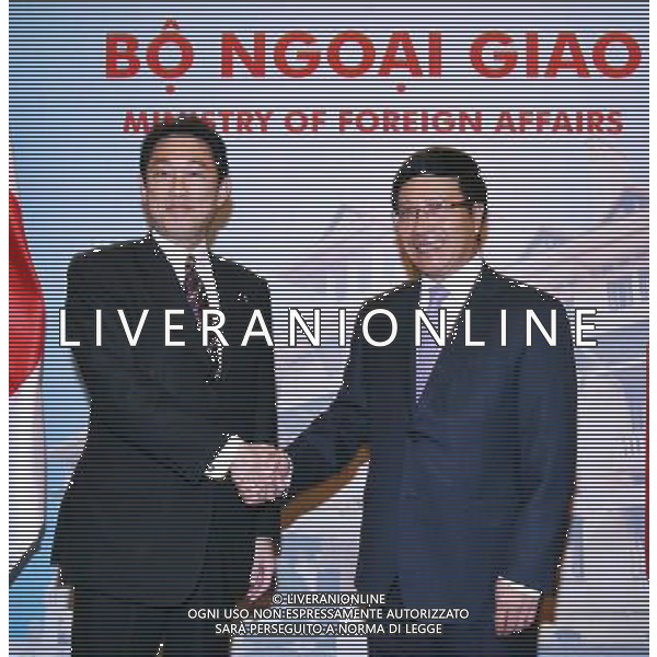 (140801) -- HANOI, Aug. 1, 2014 (Xinhua) -- Japanese Foreign Minister Fumio Kishida (L) shakes hands with Vietnamese Deputy Prime Minister and Foreign Minister Pham Binh Minh in Hanoi, capital of Vietnam, Aug. 1, 2014. Japan will provide six used vessels and equipments to Vietnam for ensuring maritime security within the framework of a non-project aid package, said visiting Japanese foreign minister Fumio Kishida here Friday. (Xinhua/VNA) ****Authorized by ytfs**** ©PHOTOSHOT/Agenzia Aldo Liverani sas - ITALY ONLY - EDITORIAL USE ONLY