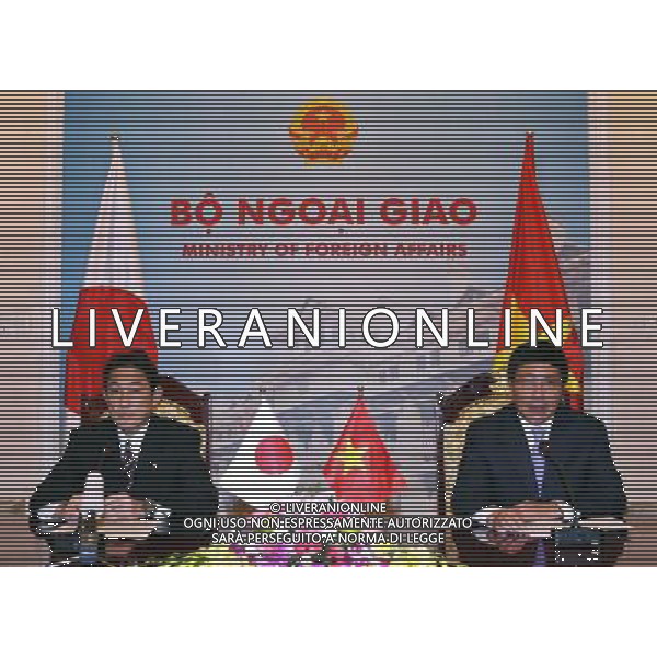 (140801) -- HANOI, Aug. 1, 2014 (Xinhua) -- Japanese Foreign Minister Fumio Kishida (L) and Vietnamese Deputy Prime Minister and Foreign Minister Pham Binh Minh attend a press conference in Hanoi, capital of Vietnam, Aug. 1, 2014. Japan will provide six used vessels and equipments to Vietnam for ensuring maritime security within the framework of a non-project aid package, said visiting Japanese foreign minister Fumio Kishida here Friday. (Xinhua/VNA) ****Authorized by ytfs**** ©PHOTOSHOT/Agenzia Aldo Liverani sas - ITALY ONLY - EDITORIAL USE ONLY