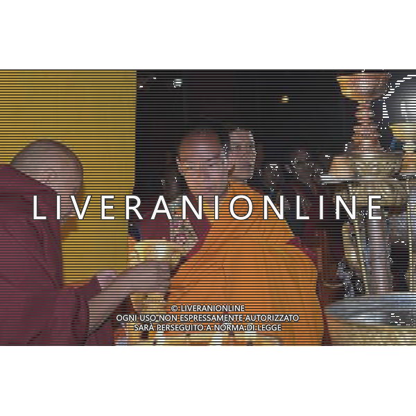 (140802) -- XIGAZE, Aug. 2, 2014 () -- The 11th Panchen Lama Bainqen Erdini Qoigyijabu (2nd L) lights a butter lamp at Sakya Monastery in Xigaze, southwest China\'s Tibet Autonomous Region, Aug. 2, 2014. A religious ceremony is held at Sakya Monastery, a prominent temple for Tibetan Buddhism\'s Sakya Sect, to celebrate the animal year of Panchen Lama Bainqen Erdini Qoigyijabu in the Chinese horoscope. There are 12 new year animals matching different lunar years in Chinese calendar, and every person takes on the animal sign of his or her birth year. (/Chogo)(wjq) ©PHOTOSHOT/Agenzia Aldo Liverani sas - ITALY ONLY - EDITORIAL USE ONLY - L\'11mo Panchen Lama Bainqen Erdini Qoigyijabu durante una cerimonia religiosa al monastero di Sakya tempio del buddismo tibetano a Xigaze , Tibet Regione autonoma sud-ovest della Cina, 2 agosto 2014