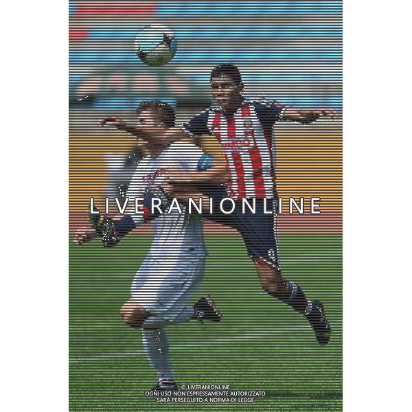 (140802) -- WEIFANG, AUG. 2, 2014 () -- Lopez Solorzano Angel Gregorio (R) of Chivas Guadalajara CD vies for the ball during the third-place-final match against Sao Paulo Futebol at the Weifang Cup International Youth Football Tournament in Weifang, east China\'s Shandong Province, Aug. 2, 2014. Sao Paulo Futebol won 1-0 and won the third place of the event. (/Guo Xulei) ©PHOTOSHOT/Agenzia Aldo Liverani sas - ITALY ONLY - EDITORIAL USE ONLY