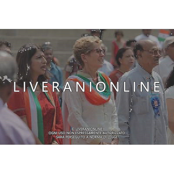 Toronto, Ontario, Canada. August 2, 2014 --- The Premier of Ontario KATHLEEN WYNNE (center) stands during the singing of the Canadian National Anthem during Panorama India Day celebrating the 68th anniversary of the independence of India. The celebrations took place in Toronto, Ontario, Canada. --- ©photoshot/Agenzia Aldo Liverani sas - ITALY ONLY - EDITORIAL USE ONLY - Il premier dell\'Ontario Kathleen Wynne durante i festeggiamenti del Panorama India Day che celebra il 68mo anniversario dell\'indipendenza dell\'India a Toronto, Canada 2 agosto 2014