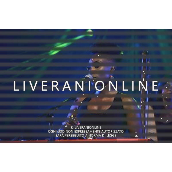 Laura Mvula performing on stage at Camp Bestival, at Lulworth Castle in Dorset, England. 2nd August 2014 ©photoshot/Agenzia Aldo Liverani sas - ITALY ONLY - EDITORIAL USE ONLY