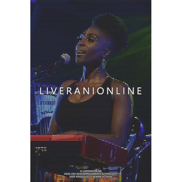 Laura Mvula performing on stage at Camp Bestival, at Lulworth Castle in Dorset, England. 2nd August 2014 ©photoshot/Agenzia Aldo Liverani sas - ITALY ONLY - EDITORIAL USE ONLY