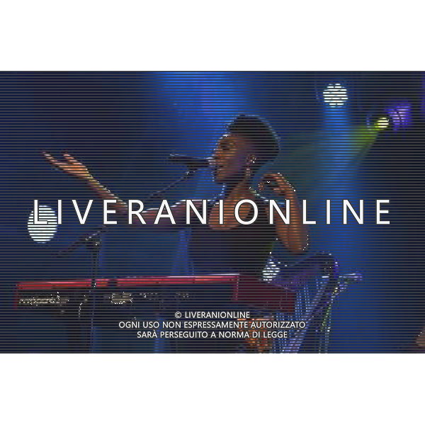Laura Mvula performing on stage at Camp Bestival, at Lulworth Castle in Dorset, England. 2nd August 2014 ©photoshot/Agenzia Aldo Liverani sas - ITALY ONLY - EDITORIAL USE ONLY