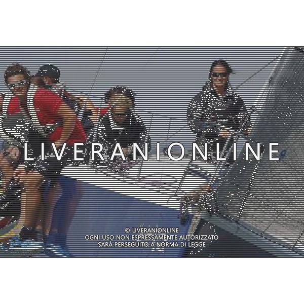 COWES, ENGLAND - AUGUST 03: Pippa Middleton with UKSA sailors during Aberdeen Asset Management Cowes Week on August 03, 2014 in Cowes, England. ©PHOTOSHOT/Agenzia Aldo Liverani sas - ITALY ONLY - EDITORIAL USE ONLY - Pippa Middleton con i marinai UKSA durante Aberdeen Asset Management Cowes Week 03 agosto 2014 in Inghilterra