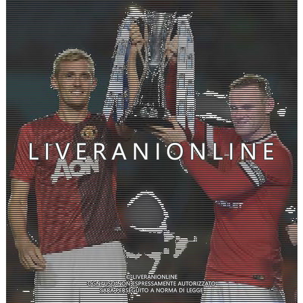 Guinnes International Champions Cup 2014 Finale Miami - 04.08.2014 Manchester United-Liverpool Nella Foto:rooney e fletcher alzano la guinnes cup /Ph.Vitez-Ag. Aldo Liverani