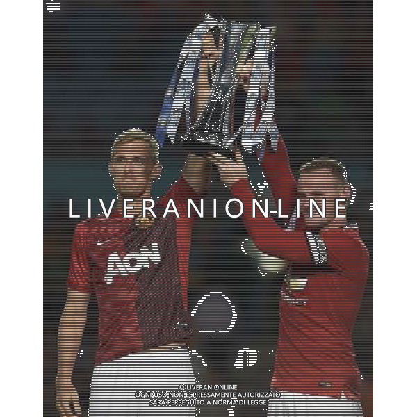 Guinnes International Champions Cup 2014 Finale Miami - 04.08.2014 Manchester United-Liverpool Nella Foto:rooney e fletcher alzano la guinnes cup /Ph.Vitez-Ag. Aldo Liverani