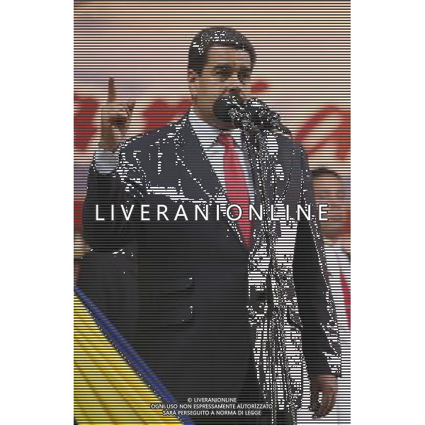 (140805) -- CARACAS, Aug. 5, 2014 (Xinhua) -- Venezuelan President Nicolas Maduro participates in the commemoration of the 77 anniversary of the National Bolivarian Guard in the Tiuna Fort, in Caracas, Venezuela, on Aug. 4, 2014. (Xinhua/Juan Carlos de la Cruz/AVN) ©PHOTOSHOT/Agenzia Aldo Liverani sas - ITALY ONLY - EDITORIAL USE ONLY - I membri della Guardia Nazionale Bolivariana partecipare alla commemorazione del suo 77mo anniversario nel Tiuna Fort a Caracas, in Venezuela, 4 agosto 2014
