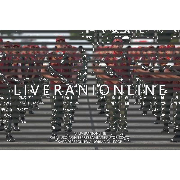 (140805) -- CARACAS, Aug. 5, 2014 (Xinhua) -- Members of the National Bolivarian Guard participate in the commemoration of its 77th anniversary in the Tiuna Fort in Caracas, Venezuela, on Aug. 4, 2014. (Xinhua/Prensa Presidencial/AVN) (rt) ©PHOTOSHOT/Agenzia Aldo Liverani sas - ITALY ONLY - EDITORIAL USE ONLY - I membri della Guardia Nazionale Bolivariana partecipare alla commemorazione del suo 77mo anniversario nel Tiuna Fort a Caracas, in Venezuela, 4 agosto 2014