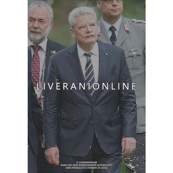MONS, BELGIUM - AUGUST 04: German Prime Minister Joachim Gauck looks at war graves at St Symphorien Military Cemetery on August 4, 2014 in Mons, Belgium. Monday 4th August marks the 100th Anniversary of Great Britain declaring war on Germany. In 1914 British Prime Minister Herbert Asquith announced at 11pm that Britain was to enter the war after Germany had violated Belgium\'s neutrality. The First World War or the Great War lasted until 11 November 1918 and is recognised as one of the deadliest historical conflicts with millions of casualties. A series of events commemorating the 100th Anniversary are taking place throughout the day. ©PHOTOSHOT/Agenzia Aldo Liverani sas - ITALY ONLY - EDITORIAL USE ONLY - REALI INGLESI: Il principe William d\'Inghilterra e la moglie Kate Duchessa di Cambridge e il principe Harry al St Symphorien cimitero militare a Mons, Belgio 4 agosto 2014 nel 100mo Anniversario della Grande guerra