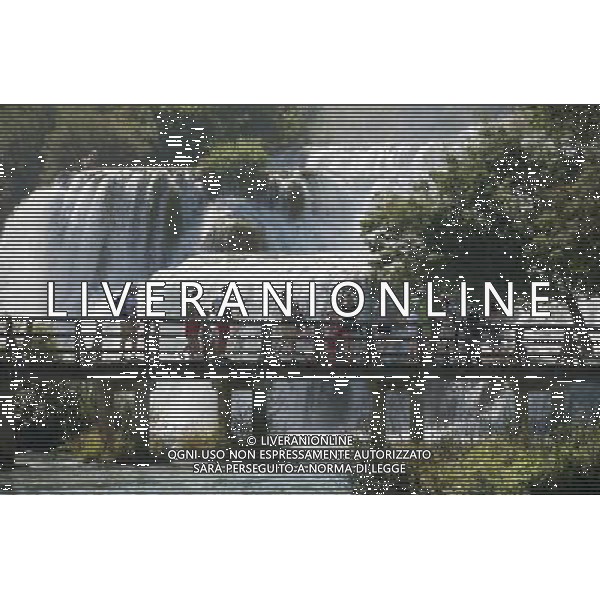 (140805) -- SKRADIN, Aug. 5, 2014 () -- People view the Skradinski Buk waterfall at the Krka National Park, one of Croatia\'s best-known nature sites and tourist destinations, in Skradin near Sibenik, southern Croatia, Aug. 4, 2014. (/Miso Lisanin) ©PHOTOSHOT/Agenzia Aldo Liverani sas - ITALY ONLY - EDITORIAL USE ONLY - Vedute della citta\' turistica sul Mar Adriatico nel sud della Croazia, 4 agosto, 2014