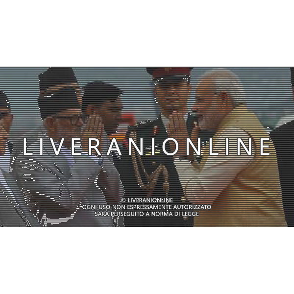 (140804) -- KATHMANDU, Aug. 4, 2014 (Xinhua) -- Nepalese Prime Minister Sushil Koirala gives farewell to Indian Prime Minister Narendra Modi (R) during his departure at Tribhuwan International Airport (TIA) in Kathmandu, Nepal, Aug. 4, 2014. Indian Prime Minister Narendra Modi concluded his two-day official visit at the invitation of his Nepalese counterpart Sushil Koirala. Modi\'s visit was the first by an Indian premier for bilateral talks since Inder Kumar Gujral visited Nepal as Indian prime minister in 1997. (Xinhua/Sunil Sharma) ****Authorized by ytfs**** ©PHOTOSHOT/Agenzia Aldo Liverani sas - ITALY ONLY - EDITORIAL USE ONLY - Il primo ministro nepalese Sushil Koirala e altri ministri danno l\'addio al Primo Ministro indiano Narendra Modi durante la sua partenza a Tribhuwan International Airport (TIA) a Kathmandu, Nepal, 4 agosto 2014