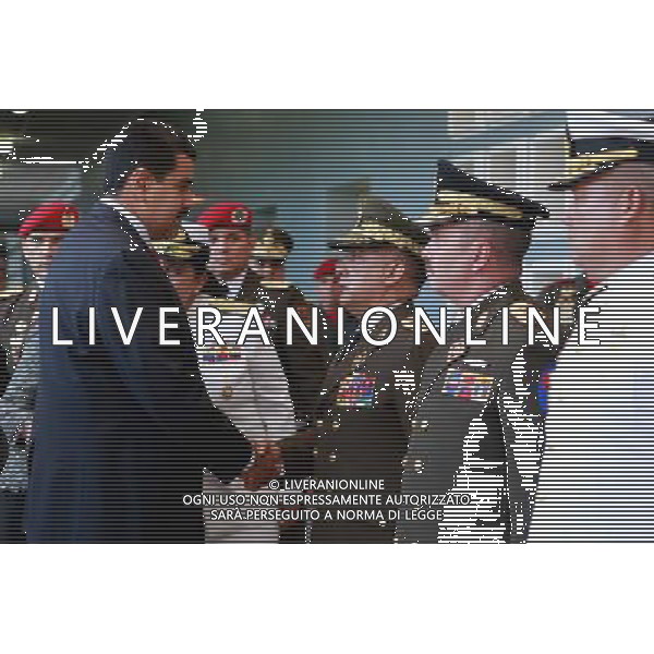 (140805) -- CARACAS, Aug. 5, 2014 () -- Venezuelan President Nicolas Maduro (L) participates in the commemoration of the 77th anniversary of the National Bolivarian Guard in the Tiuna Fort in Caracas, Venezuela, on Aug. 4, 2014.(/Prensa Presidencial/AVN) (rt) ©PHOTOSHOT/Agenzia Aldo Liverani sas - ITALY ONLY - EDITORIAL USE ONLY