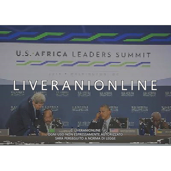 United States President Barack Obama listens while Secretary of State John Kerry assists Mohamed Ould Abdel Aziz, the President of Mauritania, before Session One: Investing in Africa\'s Future, during the Africa Leaders Summit at the State Department in Washington DC, August 6, 2014. Obama is promoting business relationships between the United States and African countries during the three-day U.S.-Africa Leaders Summit, where 49 heads of state are meeting in Washington. AG ALDO LIVERANI SAS ONLY ITALY