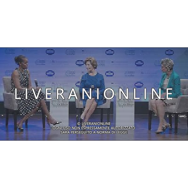 Conversation between first lady Michelle Obama and former first lady Laura Bush on \'Investing in our Future at the U.S. - Africa Leaders Summit at the John F. Kennedy Center for the Performing Arts in Washington, D.C. on Wednesday, August 6, 2014. From left to right: Michelle Obama, Laura Bush, Cokie Roberts. AG ALDO LIVERANI SAS ONLY ITALY