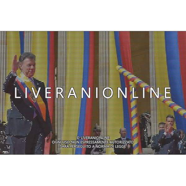 (140808) -- BOGOTA, Aug. 8, 2014 () -- Photo provided by Colombia\'s Presidency shows Colombian President Juan Manuel Santos attending the swearing-in ceremony in Bogota, capital of Colombia, on Aug. 7, 2014. Santos was sworn in for a second term on Thursday. (/Colombia\'s Presidency) ©photoshot/Agenzia Aldo Liverani sas - ITALY ONLY - EDITORIAL USE ONLY - Cerimonia di inaugurazione per il secondo mandato del rieletto presidente colombiano Juan Manuel Santos a Bogota\', capitale della Colombia, il 7 agosto, 2014