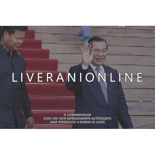 (140808) -- PHNOM PENH, Aug. 8, 2014 () -- Cambodian Prime Minister Hun Sen (R) gestures after attending a parliamentary session in Phnom Penh, Cambodia, Aug. 8, 2014. All 55 CNRP members of parliament attended the parliamentary session for the first time on Friday after they boycotted the parliament for 10 months following a disputed election last July. (/Sovannara) (lyi) ©photoshot/Agenzia Aldo Liverani sas - ITALY ONLY - EDITORIAL USE ONLY