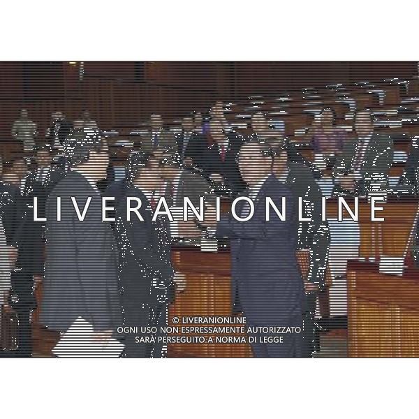 (140808) -- PHNOM PENH, Aug. 8, 2014 () -- Cambodian Prime Minister Hun Sen (R) talks with opposition members of parliament after a parliamentary session in Phnom Penh, Cambodia, Aug. 8, 2014. All 55 members of parliament of the opposition Cambodia National Rescue Party attended the parliamentary session for the first time on Friday after they boycotted the parliament for 10 months following a disputed election last July. (/Sovannara) (lyi) ©photoshot/Agenzia Aldo Liverani sas - ITALY ONLY - EDITORIAL USE ONLY