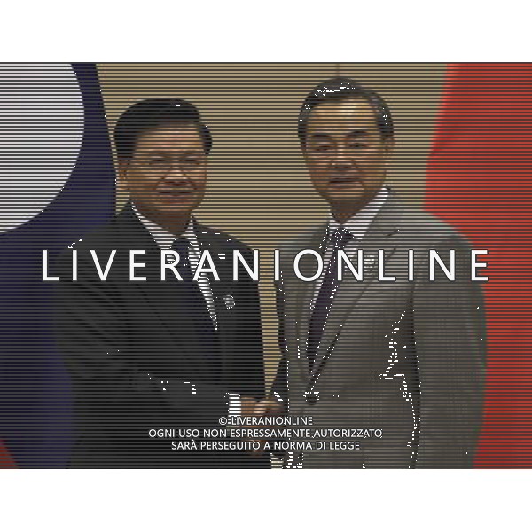 (140809) -- NAY PYI TAW, Aug. 9, 2014 () -- Chinese Foreign Minister Wang Yi (L) meets with Laotian Deputy Prime Minister and Foreign Minister Thongloun Sisoulith on the sidelines of the series of Foreign Ministers\' Meetings on East Asia cooperation in Myanmar\'s capital of Nay Pyi Taw, Aug. 8, 2014.(/U Aung) (yc) ©photoshot/Agenzia Aldo Liverani sas - ITALY ONLY - EDITORIAL USE ONLY