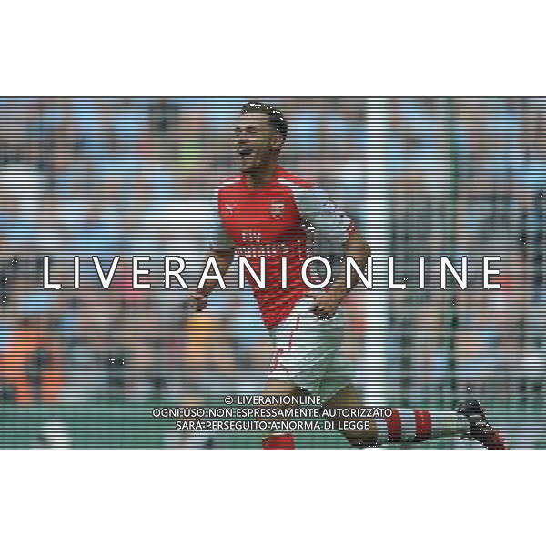 AARON RAMSEY SCORES \' CELEBRATES ARSENAL FC V MANCHESTER CITY FC THE FA COMMUNITY SHIELD 2014 WEMBLEY STADIUM, LONDON, ENGLAND 10 August 2014 GAU81569 THE FA COMMUNITY SHIELD 2014 WARNING! This Photograph May Only Be Used For Newspaper And/Or Magazine Editorial Purposes. May Not Be Used For Publications Involving 1 player, 1 Club Or 1 Competition Without Written Authorisation From Football DataCo Ltd. For Any Queries, Please Contact Football DataCo Ltd on +44 (0) 207 864 9121 AG ALDO LIVERANI SAS ONLY ITALY