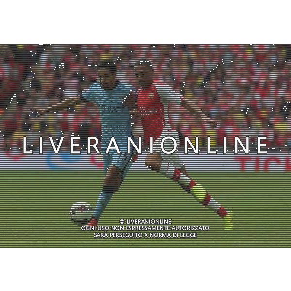 Manchester City\'s Jesœs Navas holds of Arsenal\'s Kieran Gibbs Photographer Kieran Galvin/CameraSport Football Friendly - FA Community Shield - Arsenal v Manchester City - Sunday 10th August 2014 - Wembley - London © CameraSport - 43 Linden Ave. Countesthorpe. Leicester. England. LE8 5PG - Tel: +44 (0) 116 277 4147 - admin@camerasport.com - www.camerasport.com AG ALDO LIVERANI SAS ONLY ITALY