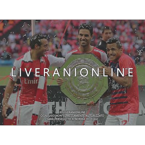 Arsenal\'s Santi Cazorla,Arsenal\'s Mikel Arteta and Arsenal\'s Alexis S‡nchez with the FA Community Shield Photographer Kieran Galvin/CameraSport Football Friendly - FA Community Shield - Arsenal v Manchester City - Sunday 10th August 2014 - Wembley - London © CameraSport - 43 Linden Ave. Countesthorpe. Leicester. England. LE8 5PG - Tel: +44 (0) 116 277 4147 - admin@camerasport.com - www.camerasport.com AG ALDO LIVERANI SAS ONLY ITALY