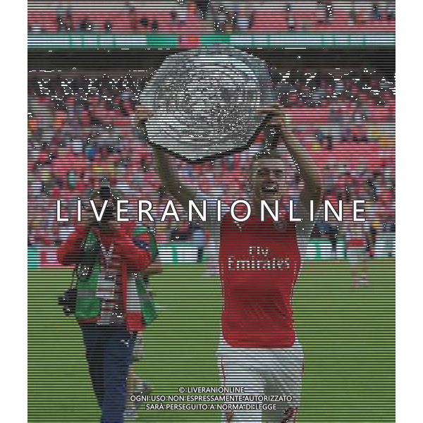 Arsenal\'s Calum Chambers with the FA Community Shield Photographer Kieran Galvin/CameraSport Football Friendly - FA Community Shield - Arsenal v Manchester City - Sunday 10th August 2014 - Wembley - London © CameraSport - 43 Linden Ave. Countesthorpe. Leicester. England. LE8 5PG - Tel: +44 (0) 116 277 4147 - admin@camerasport.com - www.camerasport.com AG ALDO LIVERANI SAS ONLY ITALY
