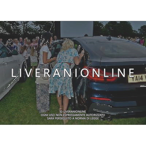  Danielle Armstrong and Jasmin Walia exchange a kiss at the Essex Drive-In Movie, Grease, Brentwood Essex Date ; 09/08/2014 AG ALDO LIVERANI SAS ONLY ITALY